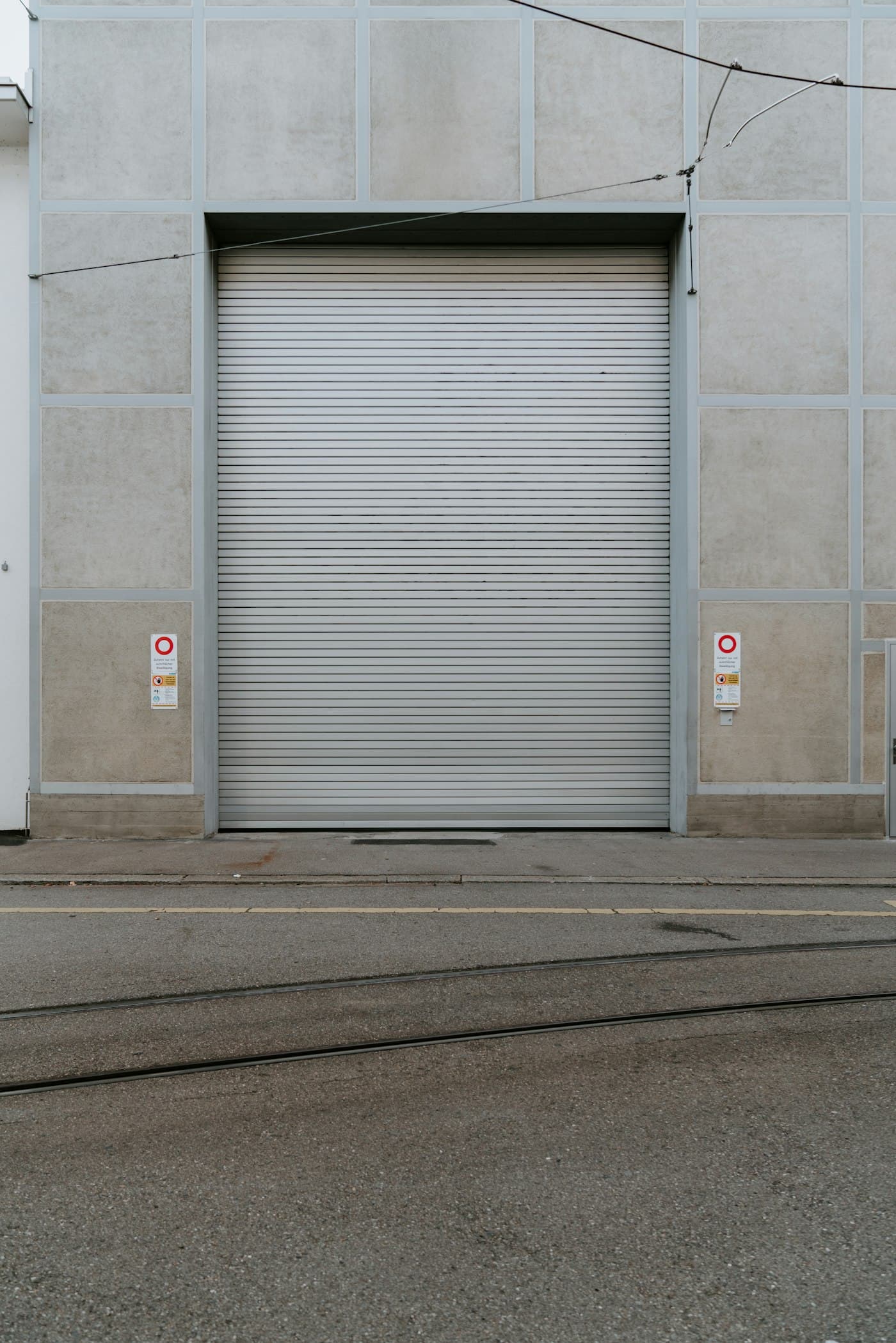 Plain patti mild steel rolling shutter on commercial shop front