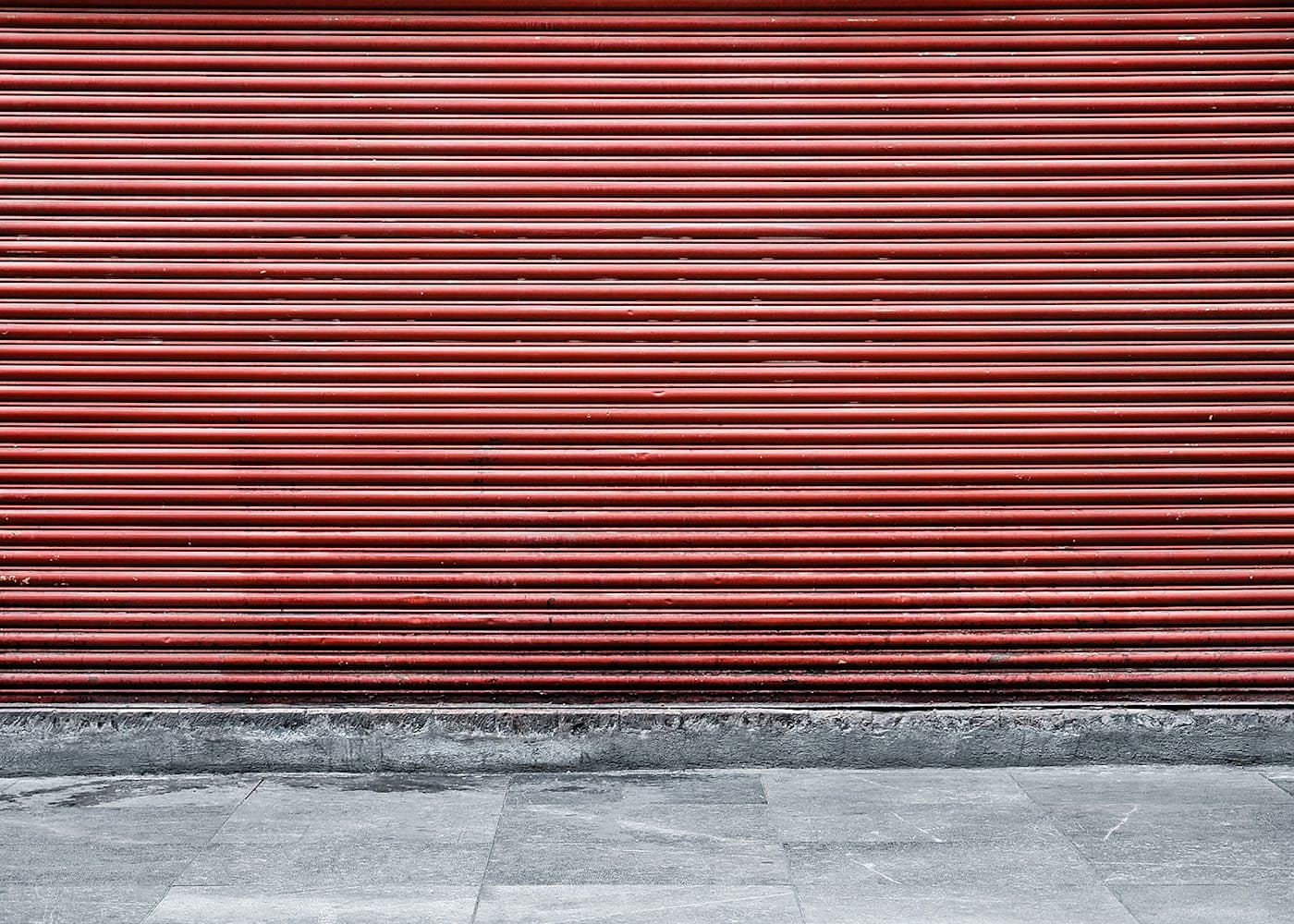 Metal roller shutter on building facade